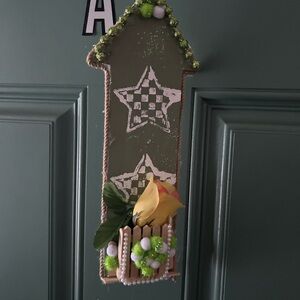 Decorative Green Wall Hanging with Yellow Flower